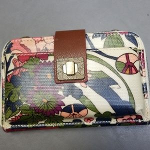 Sakroots phone wallet with strap.
